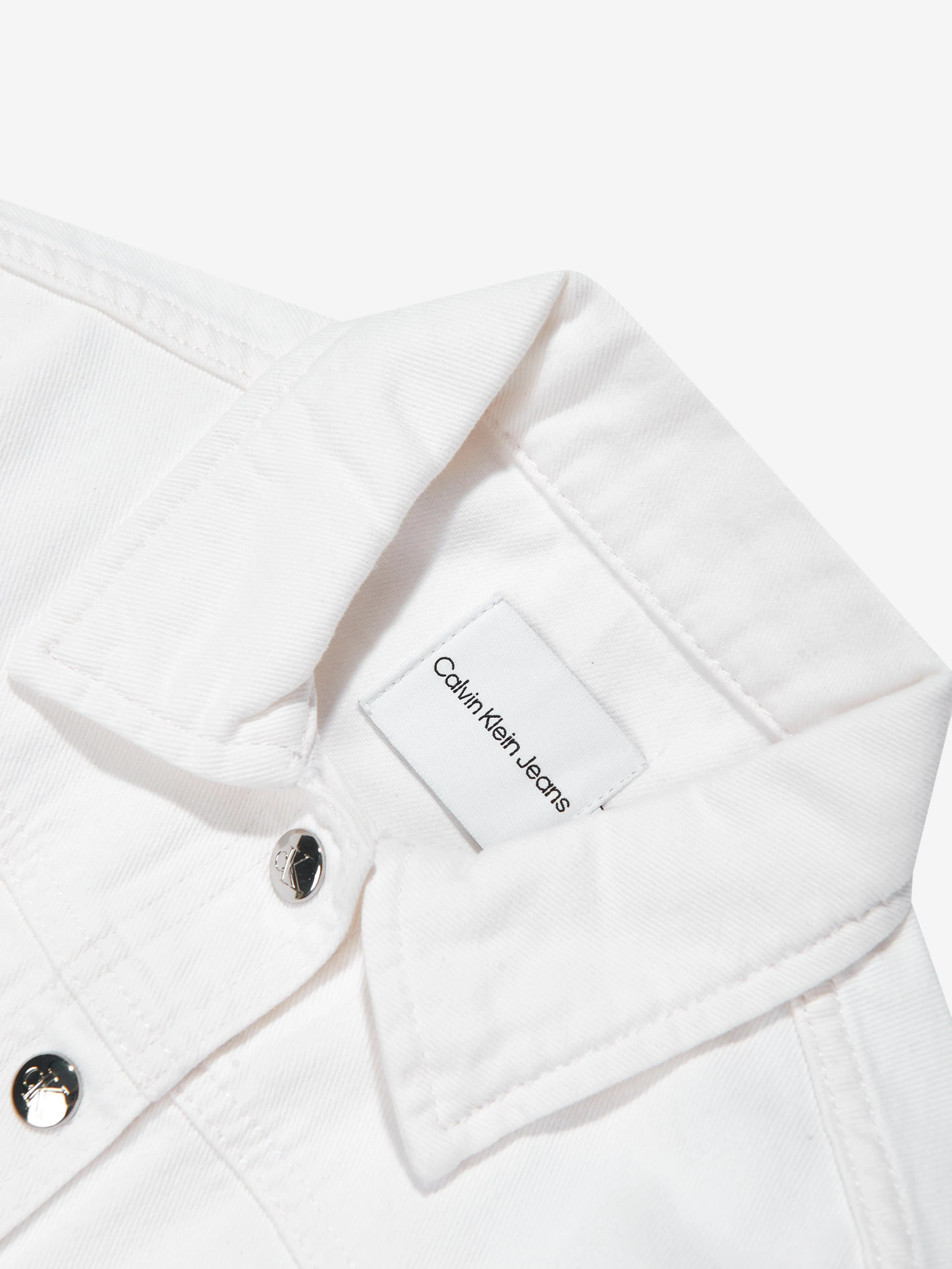 Veste en jean à boutons Calvin Klein pour filles en ivoire