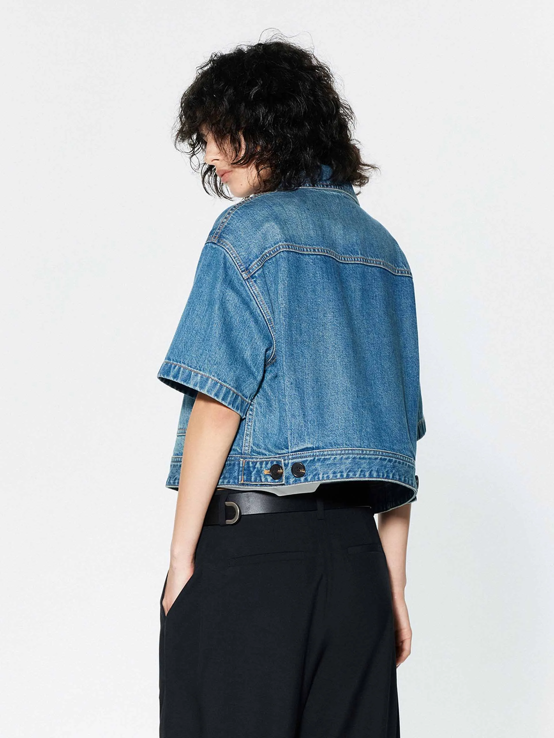 Veste en jean à poches coupées