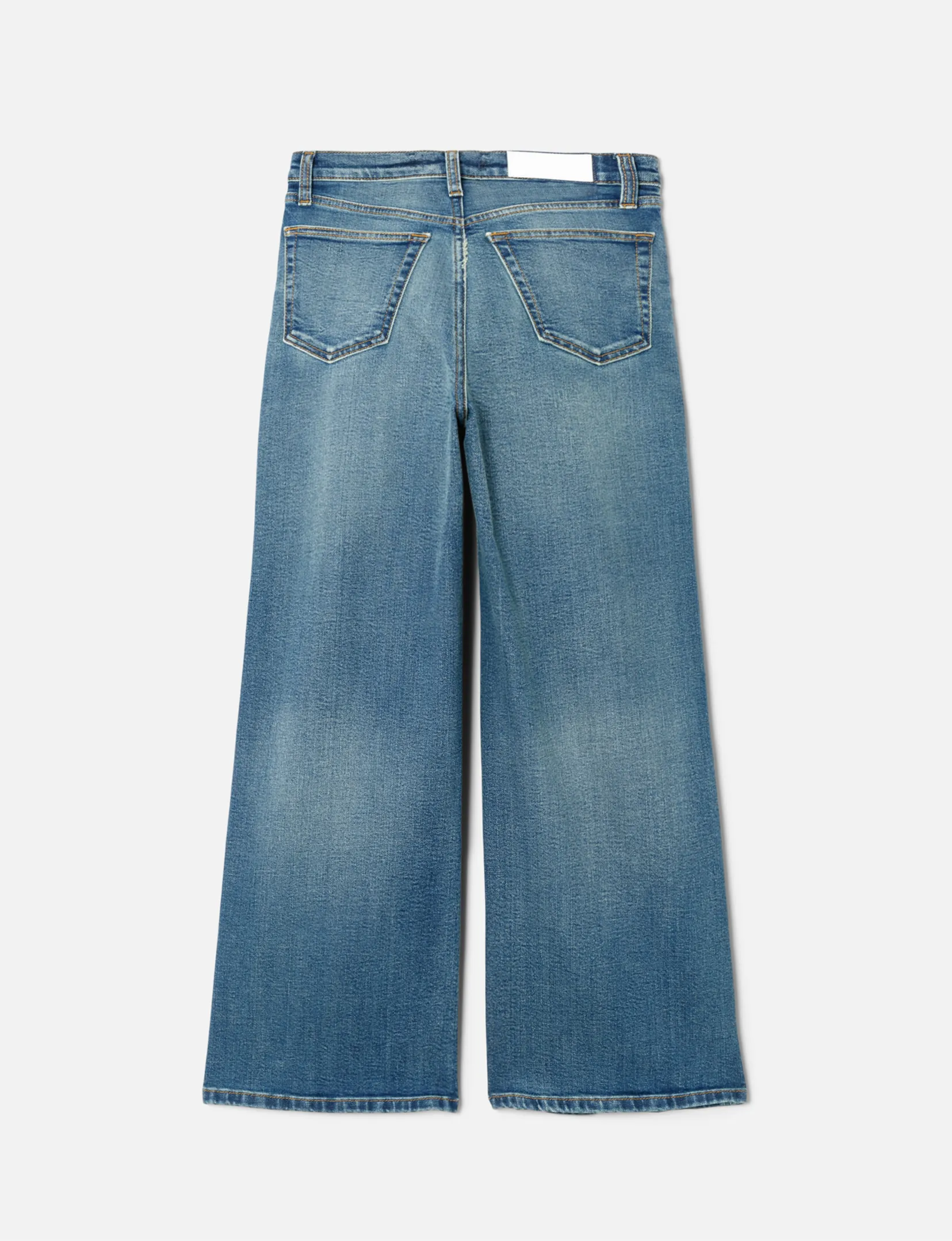 Pantalon large coupé haut retravaillé, vêtement en indigo artisanale