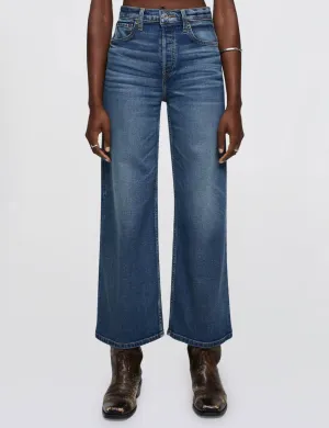 Pantalon large coupé haut retravaillé, vêtement en indigo artisanale