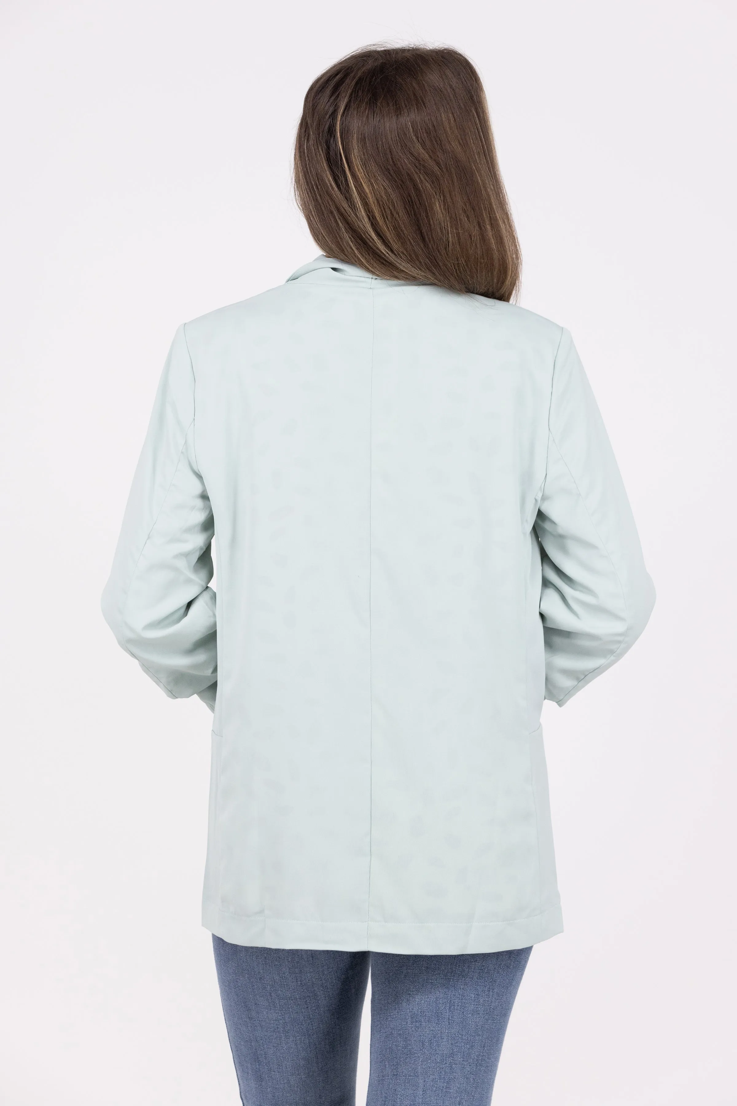 Veste structurée ruchée pour femme avec une touche de surprise