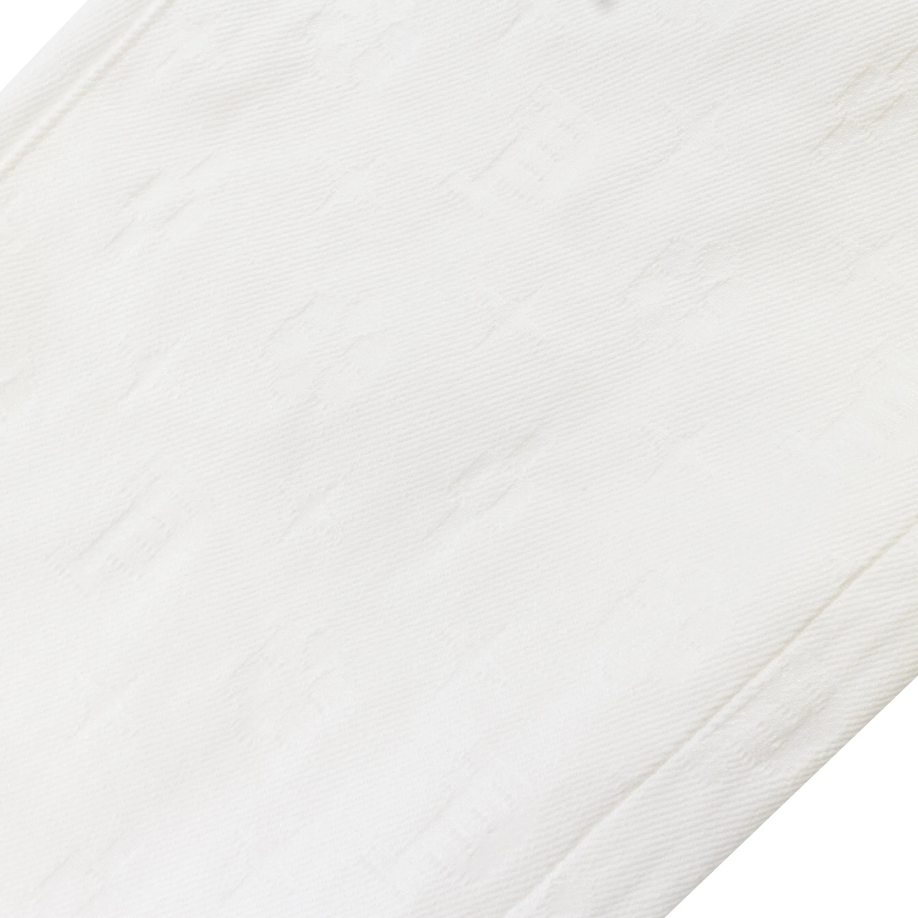 JEAN SKINNY BLANC EN JACQUARD MONOGRAMME FILM BLANC